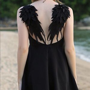 Black feather wing dress